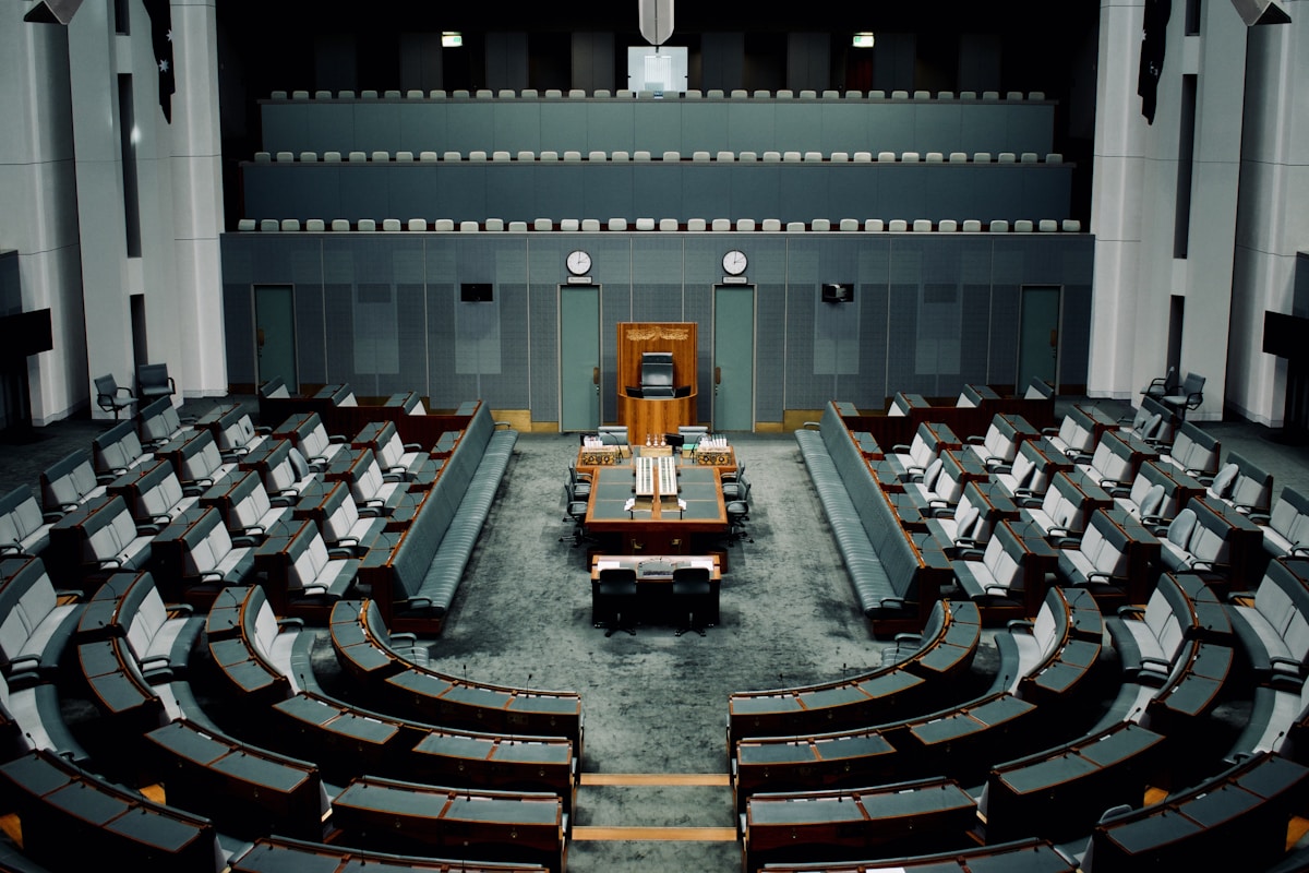 tables and chairs inside the hall