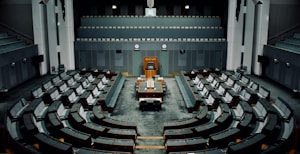 tables and chairs inside the hall