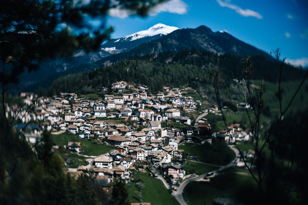 aerial photography of city near rocky mountain during daytime