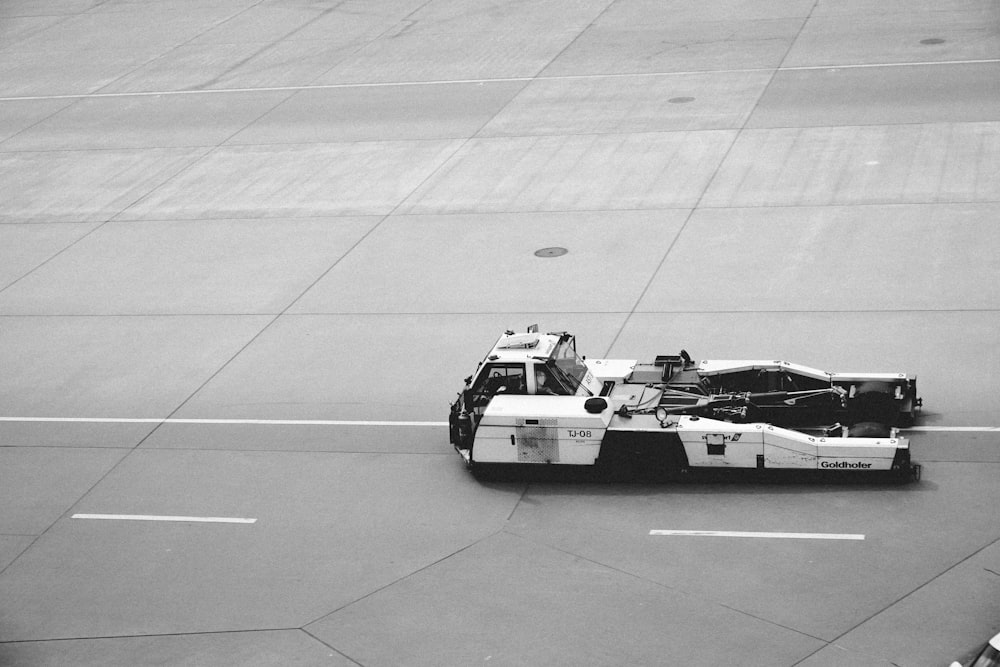 white and black truck at road