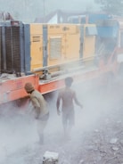 A technician inspecting a dust extraction unit.