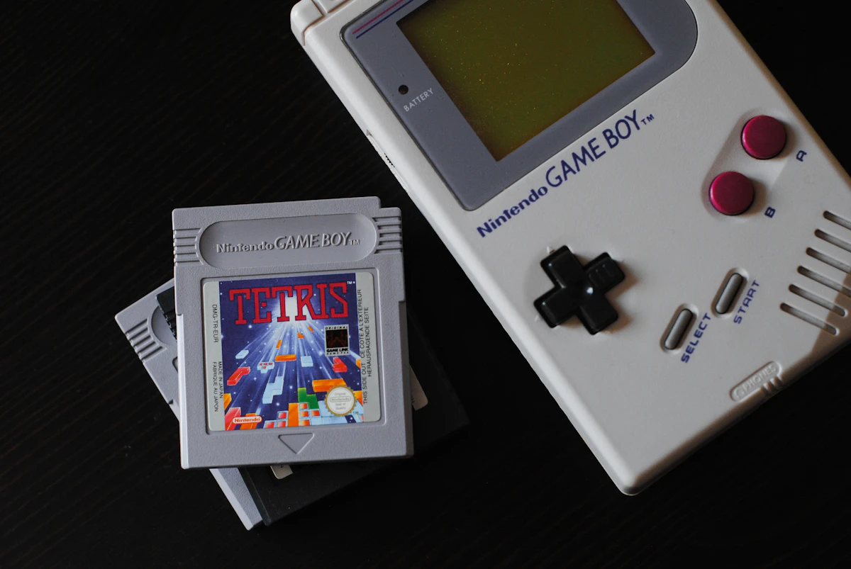 White Nintendo Game Boy photographed against a neutral background