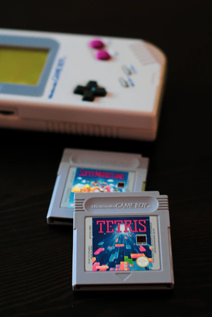 Two near-identical handhelds compared closely to spot a display difference