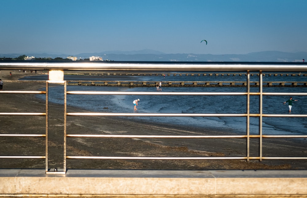 gray railings by the sea