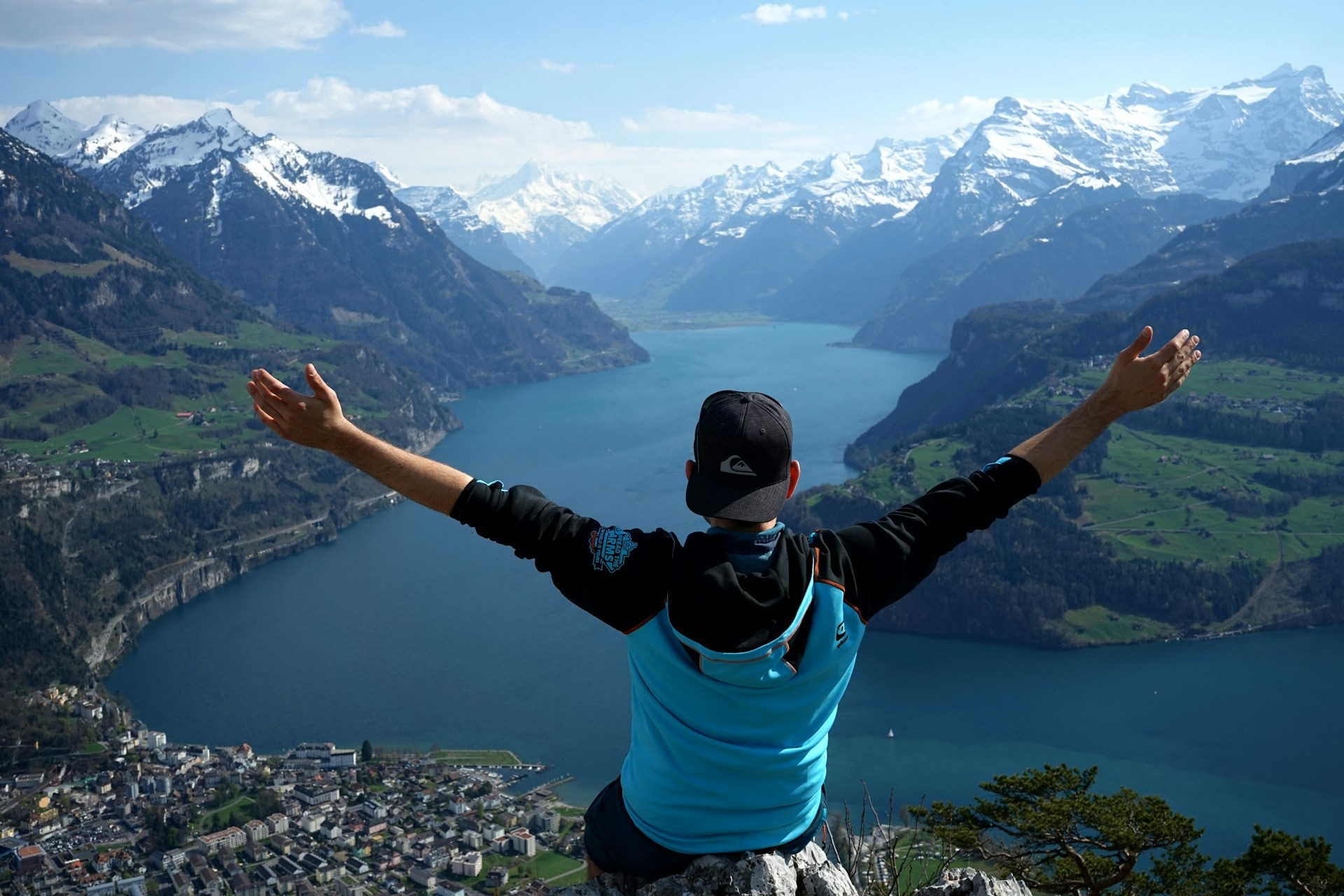 man on top of mountain