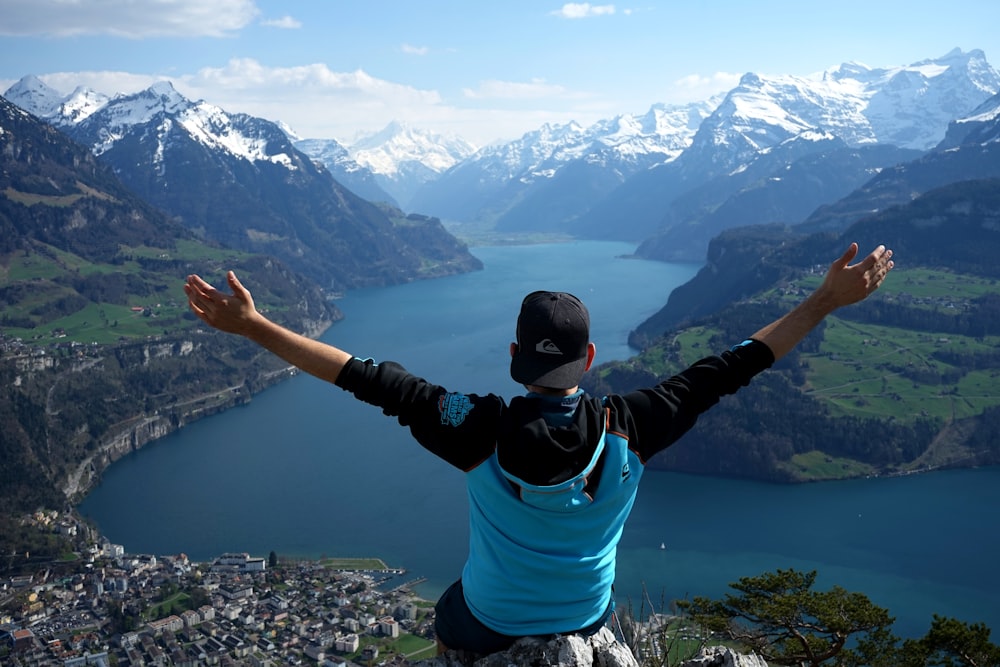 man on top of mountain