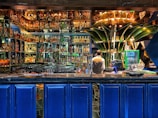 A vibrant bar area with a selection of drinks.