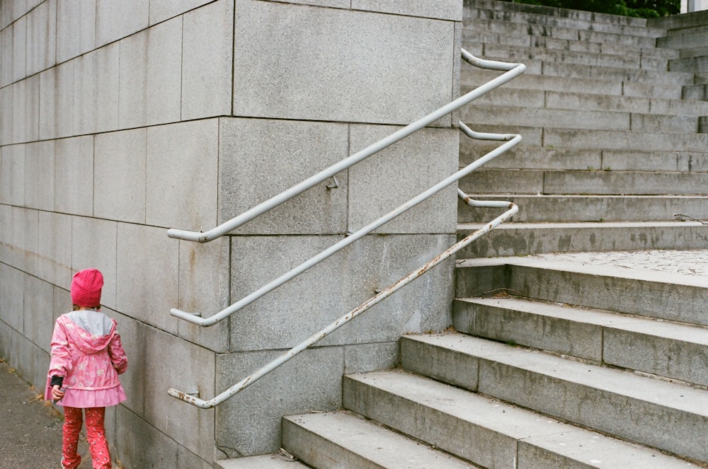 girl wearing pink hoodie