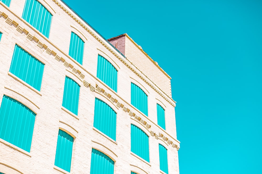 white and green concrete building facade