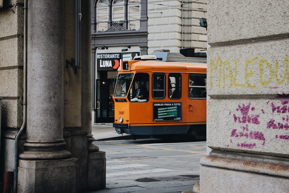 orange auto-rickshaw