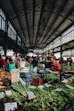 man sitting near the vegetable