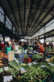 man sitting near the vegetable