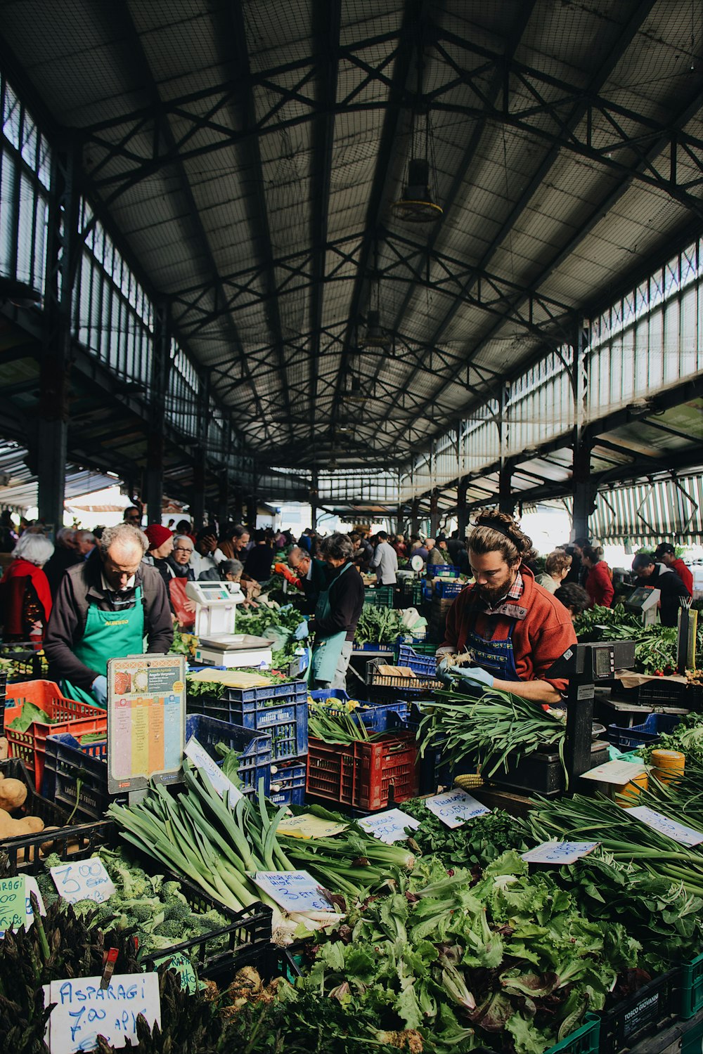 man sitting near the vegetable