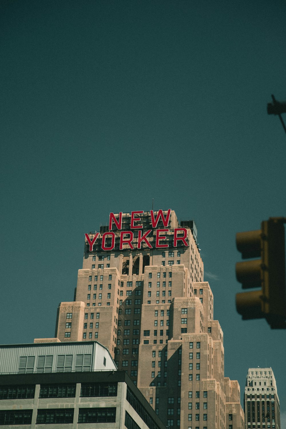 New Yorker signage mounted on building