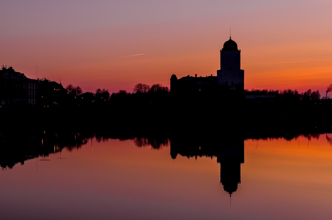 silhouette of building during golden hour