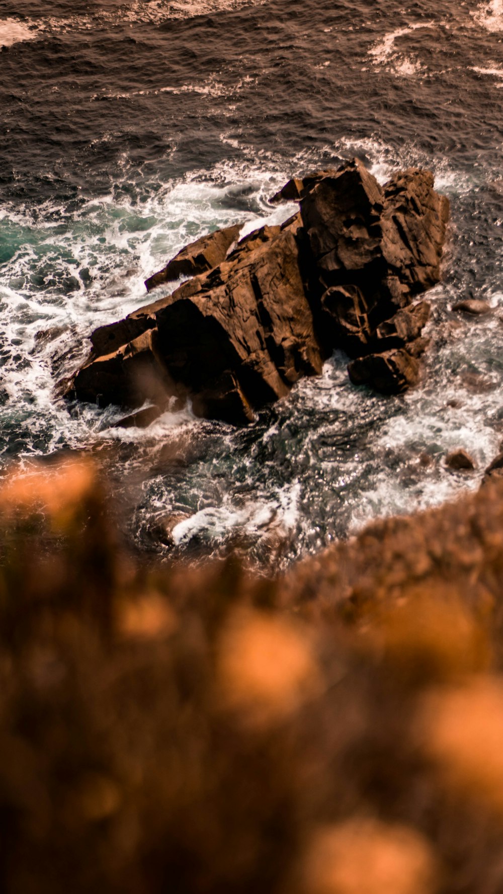 waves splashing on rocks