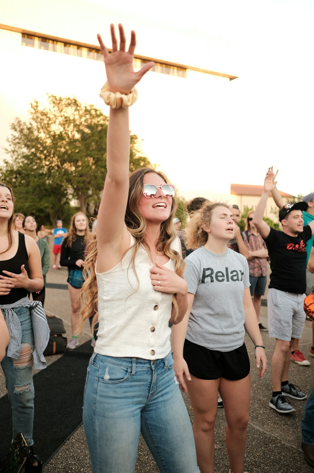 woman raising right hand