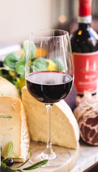 long-stem wine glass filled with red wine