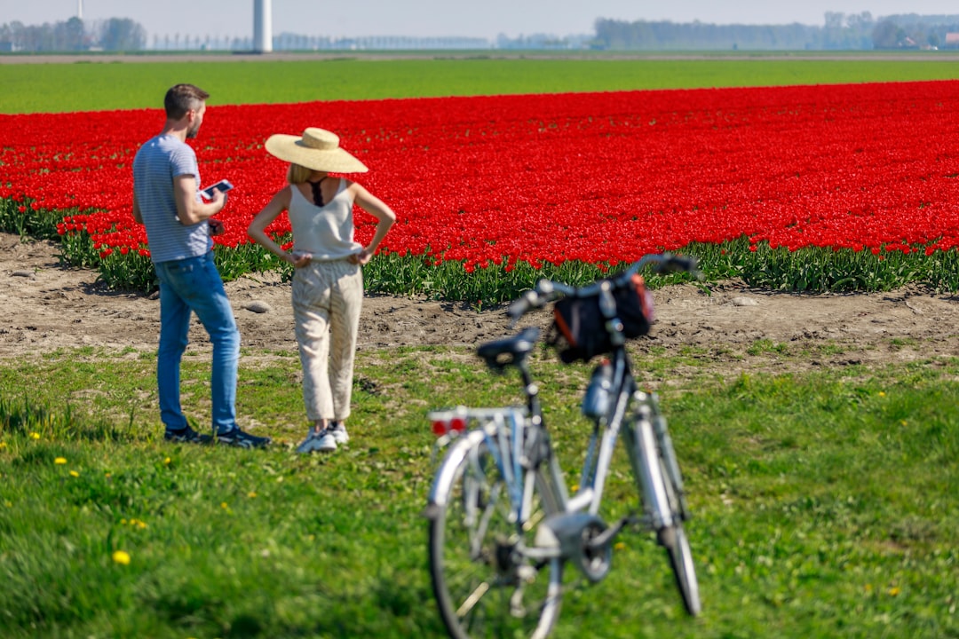 woman and man standing next to each other