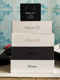 Stack of sealed Apple iPhone boxes ready for wholesale distribution