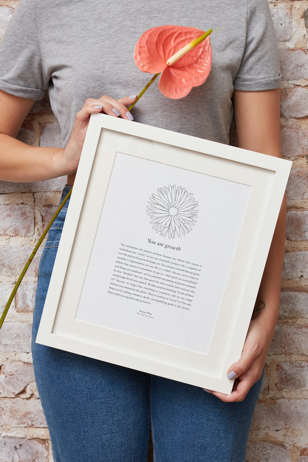 woman holding photo frame