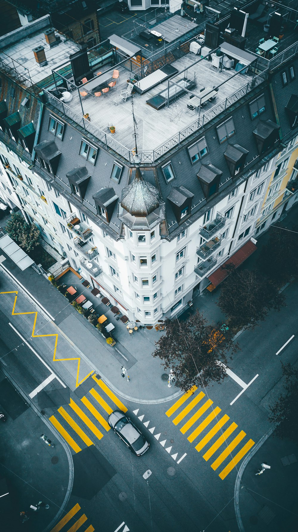 aerial photography of white and gray concrete multi-story building during daytime