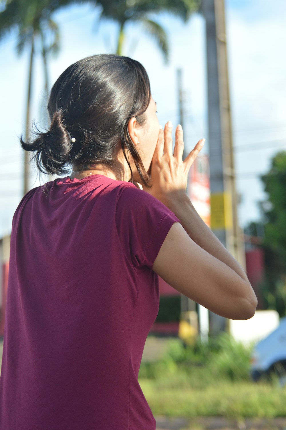 woman standing on concrete ground