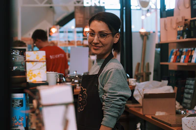 Denim aprons worn by café staff showcasing durability and style.
