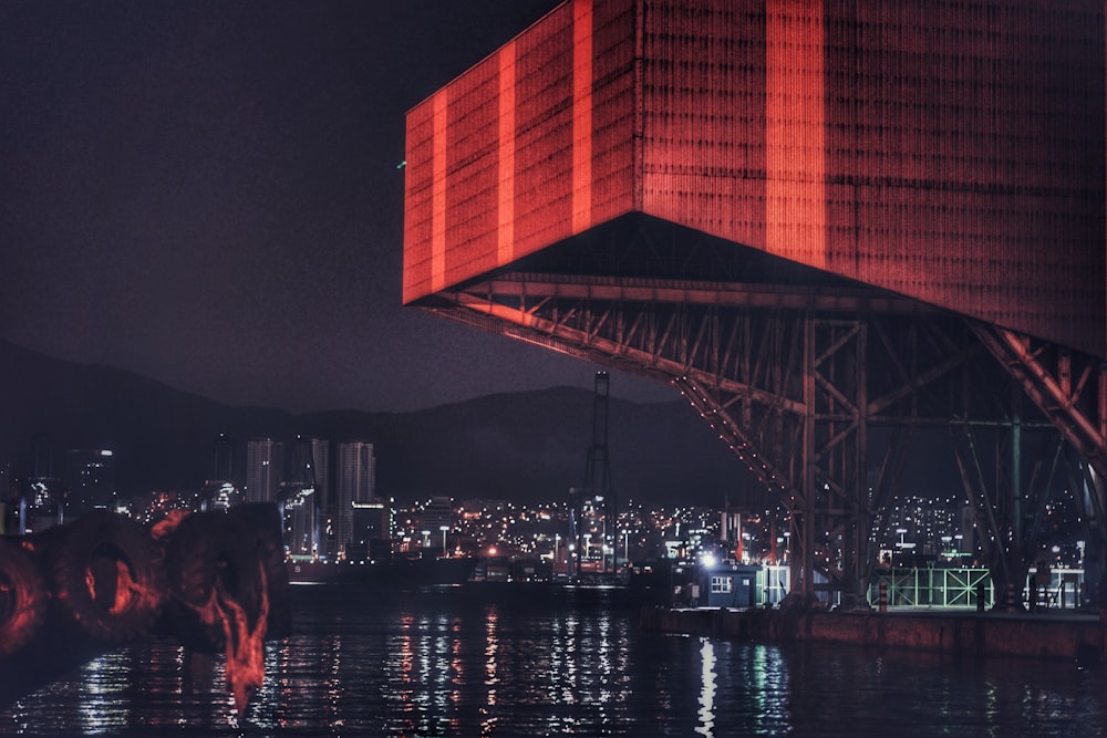 red and gray concrete building during nighttime
