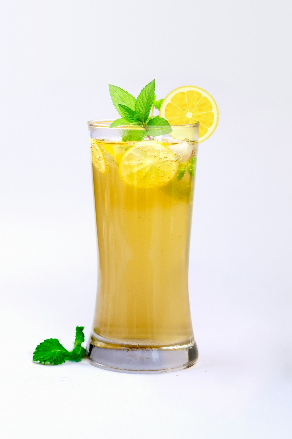 lemon juice in glass with mint herb