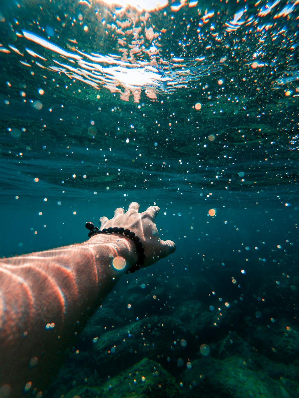 man swimming underwater