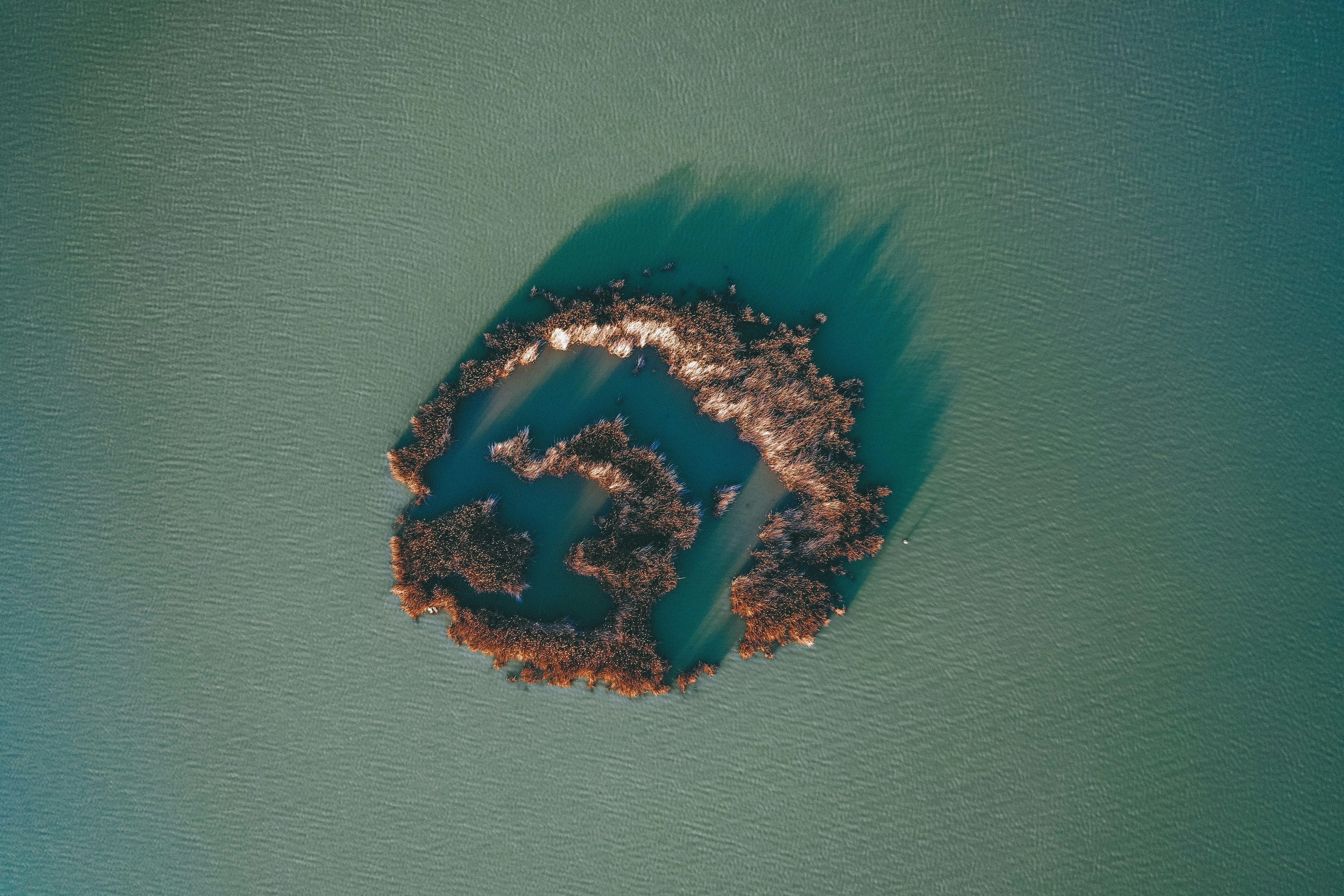 aerial photography of islet during daytime