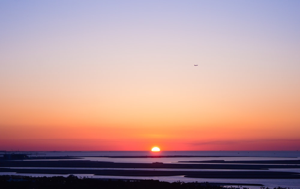 calm sea during sunset