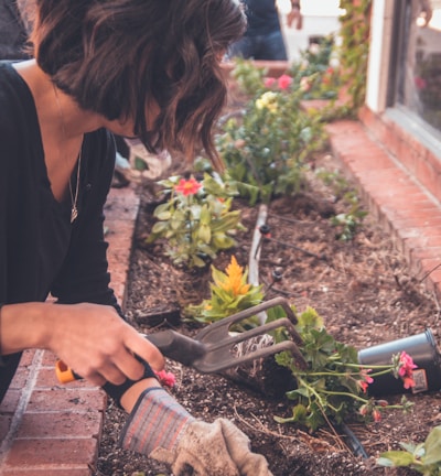 woman holding garden fork