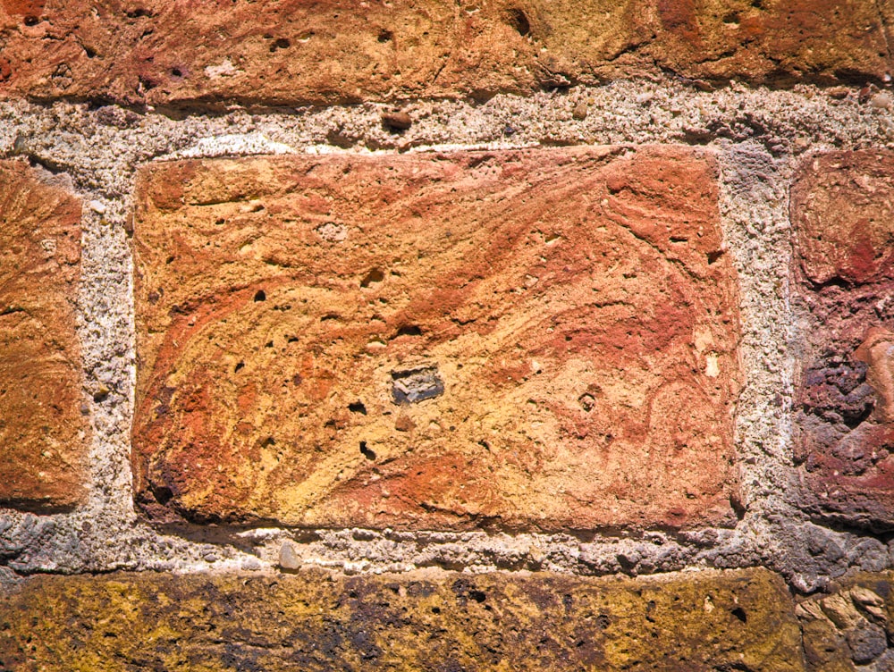 close-up photo of orange and brown brick