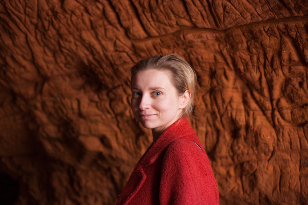 woman wearing red coat