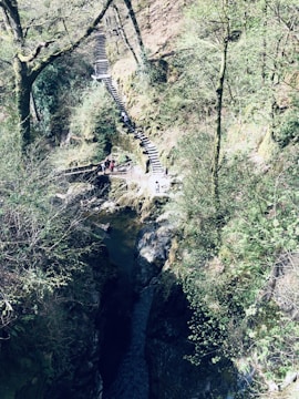 A picturesque landscape with tourists exploring.