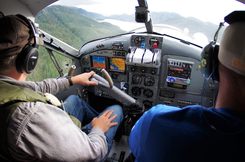 two aircraft pilots driving