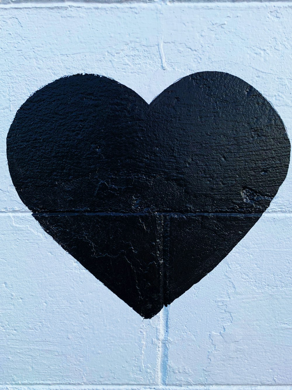 Mur en béton imprimé coeur noir