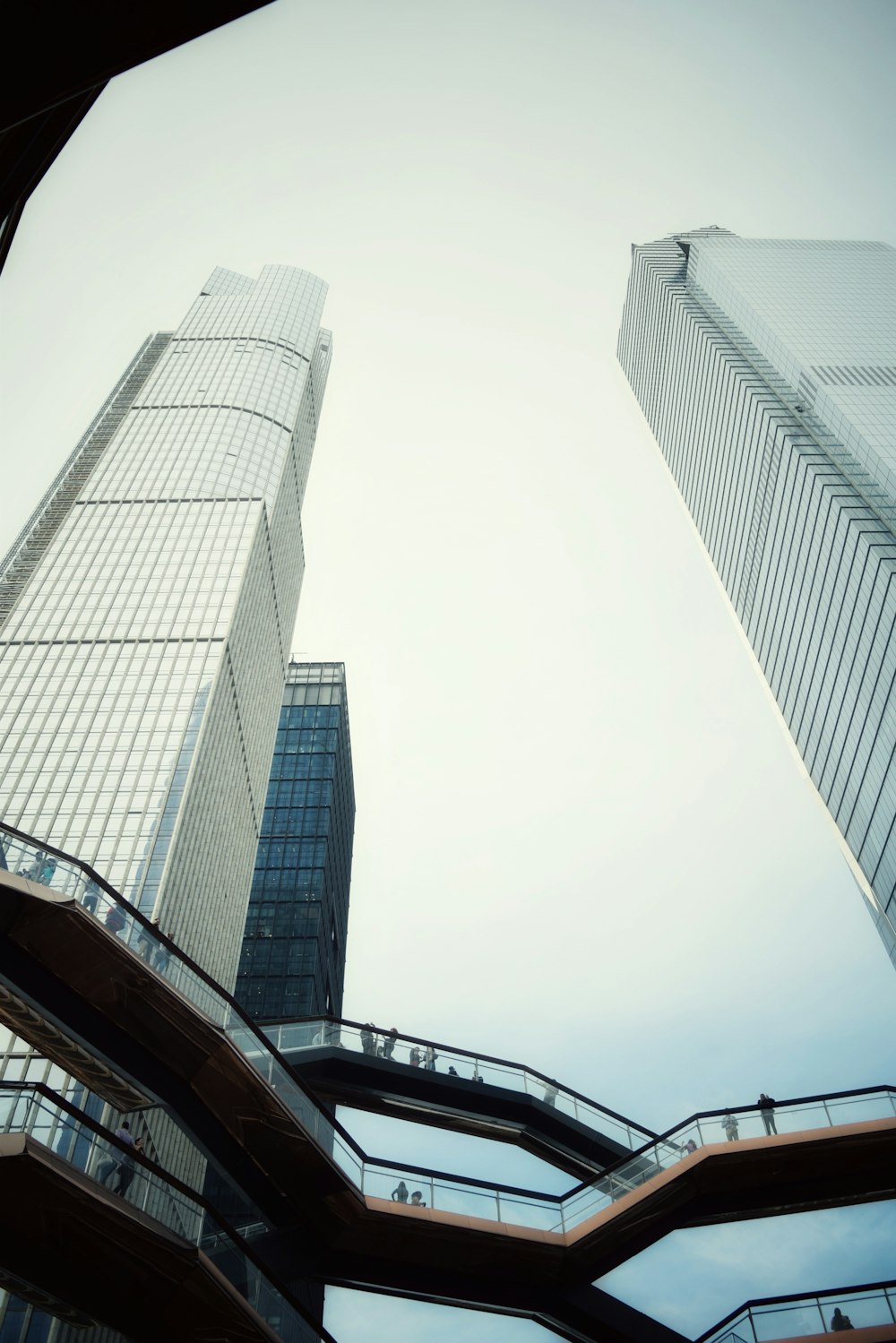 low-angle photo of curtain wall building