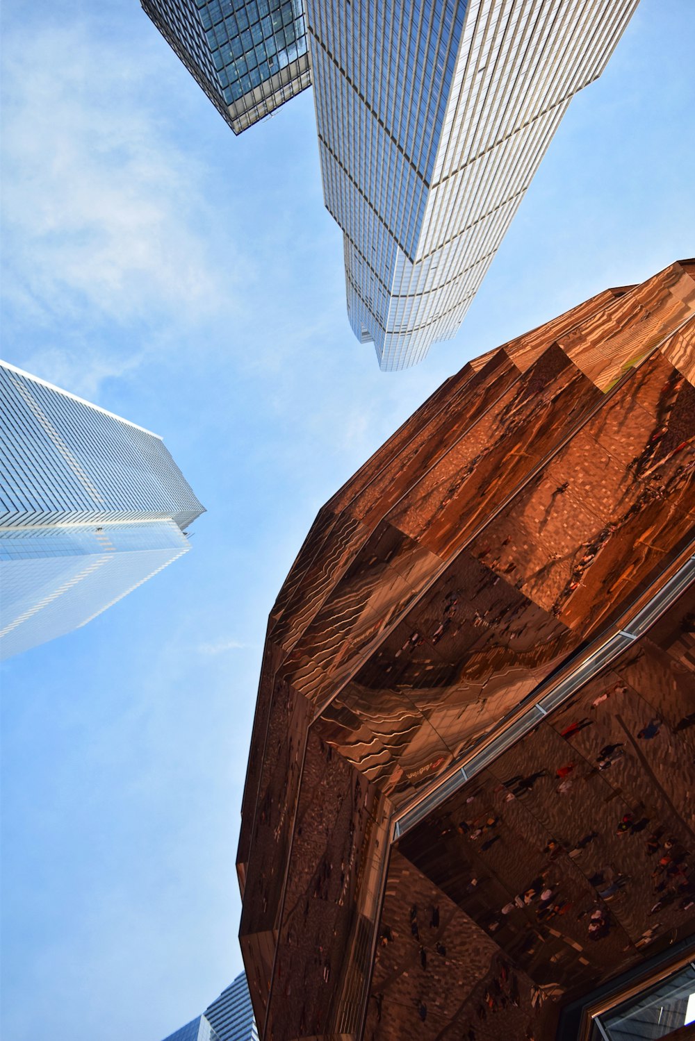 low angle photo of white and brown buildings