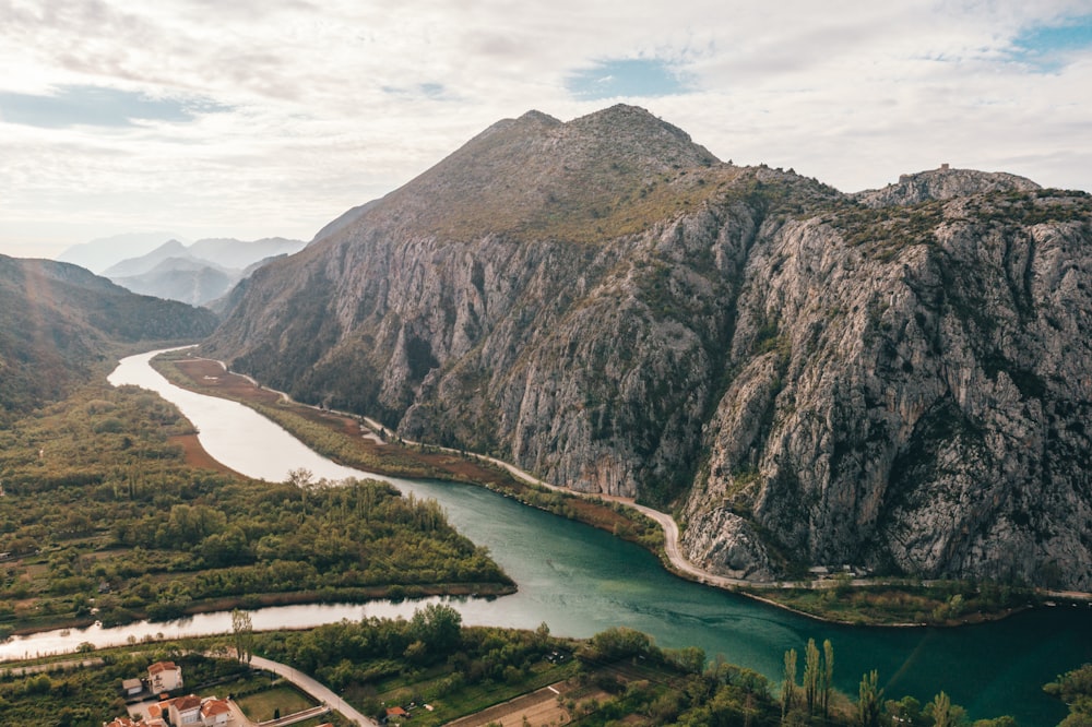 mountain near body of water