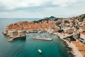 aerial view of buildings near ocean