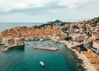 aerial view of buildings near ocean