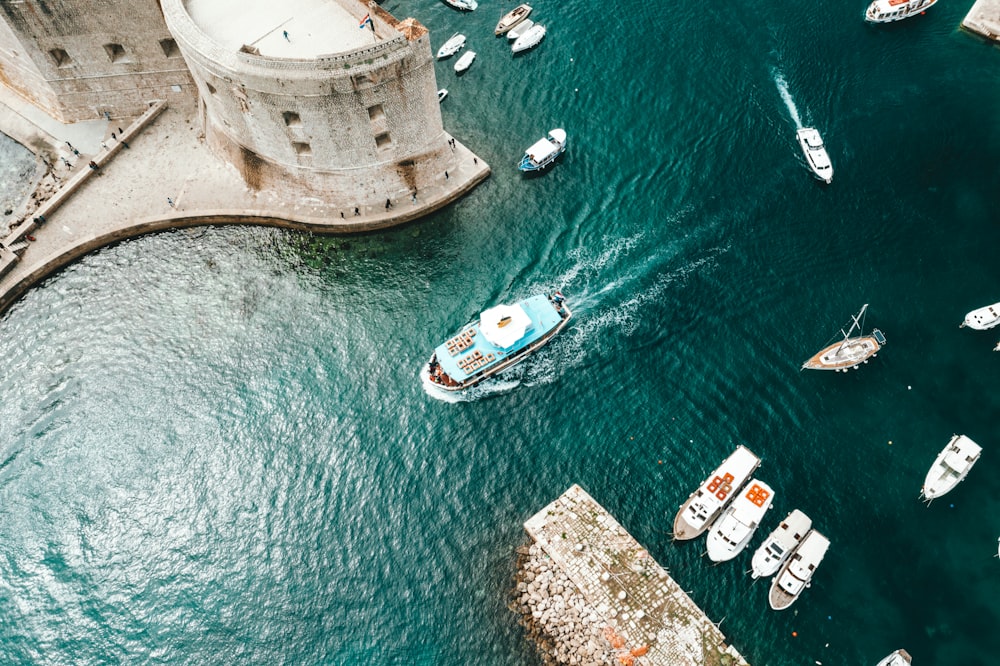 white boat near dockside