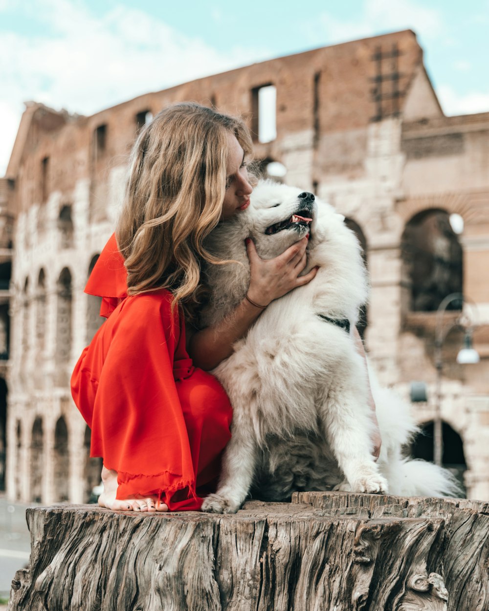 woman petting dog