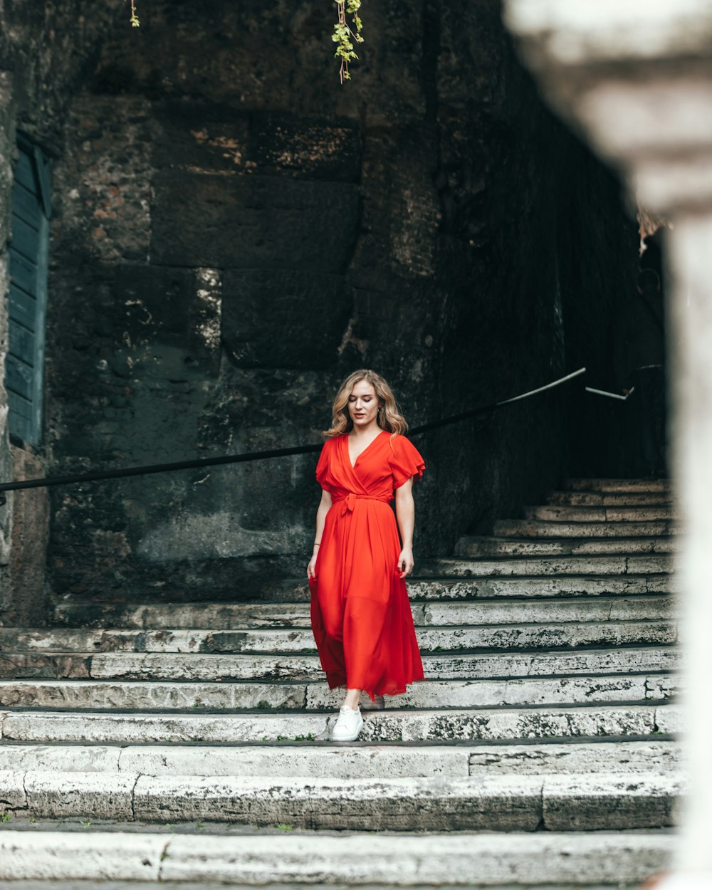 woman walking down on stair