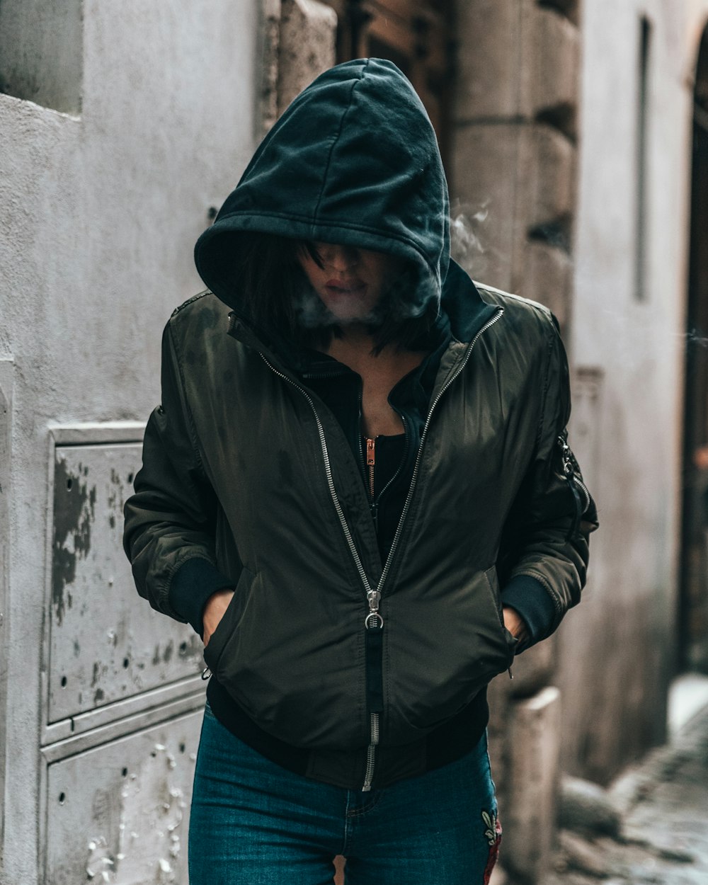 woman in jacket on street