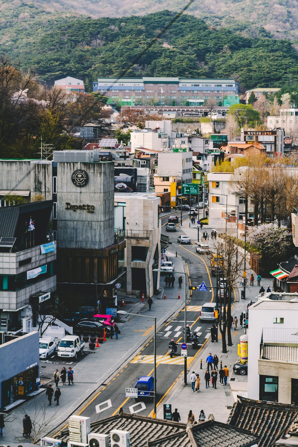 high rise building and grey concrete road