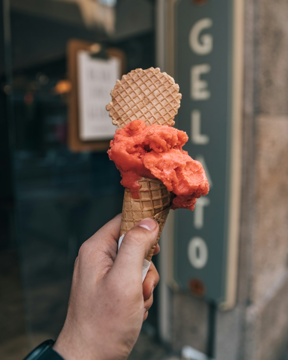 person holding ice cream